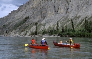 Paddle your way to heaven along the Yukon River from Lake Laberge to Dawson City. Photo: Ruby Range Adventure Ltd