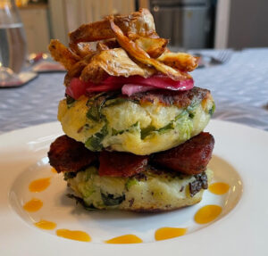 image: vegan Potato, Caraway & Cabbage Cakes with Vegan Chorizo